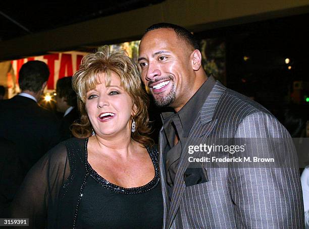 Dwana Pusser and actor Dwayne "The Rock" Johnson attend the after party for the film, "Walking Tall" on March 29, 2004 in Hollywood, California. The...