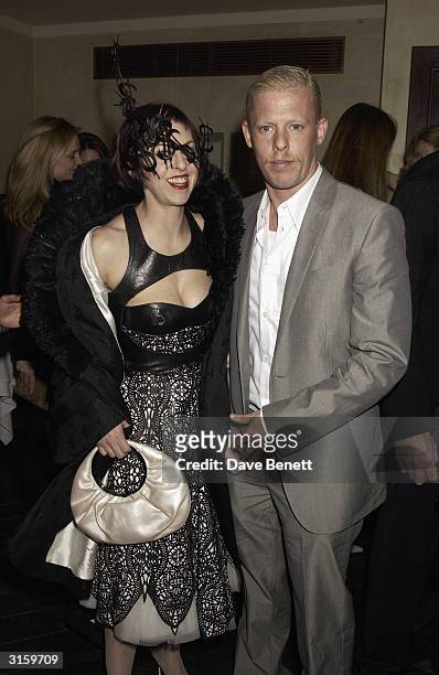 Designer Alexander McQueen and Isabella Blow attend the Tatler dinner at Floriana, at the Beauchamp place on March 19, 2003.