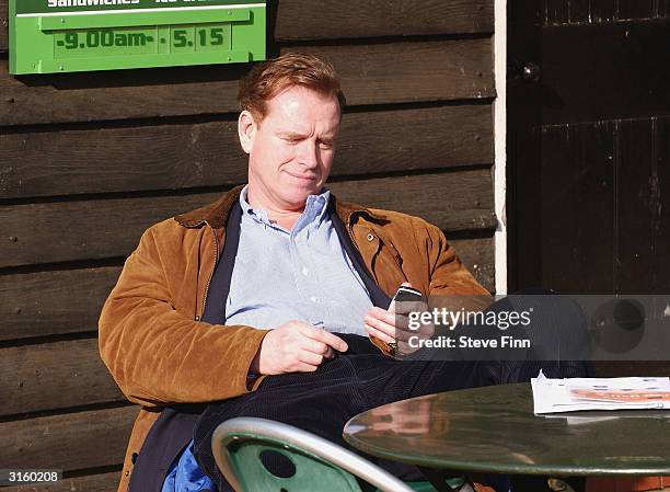 James Hewitt sits on a bench in Hyde Park on March 30, 2004 in London.