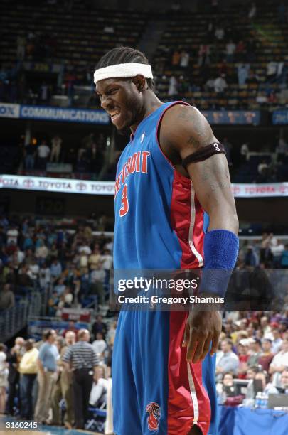 Ben Wallace of the Detroit Pistons grimaces during the game against the New Orleans Hornets at New Orleans Arena on March 23, 2004 in New Orleans,...