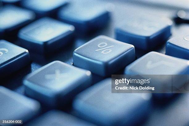 calculator keypad, close-up on percentage button, blurred effect - segno di percentuale foto e immagini stock