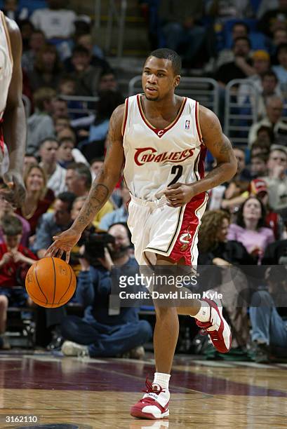 Dajuan Wagner of the Cleveland Cavaliers drives against the Detroit Pistons during the game at Gund Arena on March 21, 2004 in Cleveland, Ohio. The...