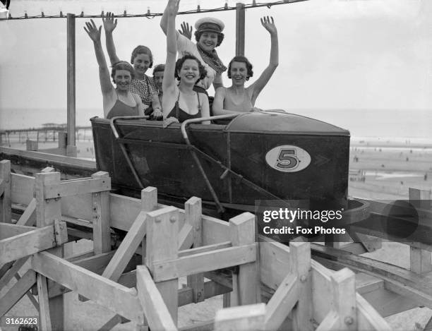 Holidaymakers on a fairground ride at Butlin's in Skegness.