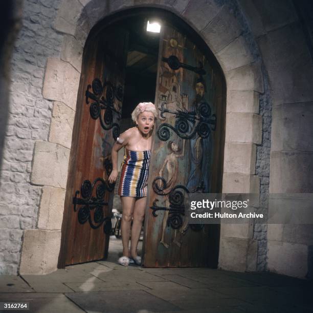 English actress and star of the 'Carry On' films, Barbara Windsor, during the filming of 'Crooks in Cloisters'.