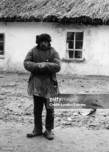 Russian peasant near Kiev during the famine. He has spent two of the last five years in prison.