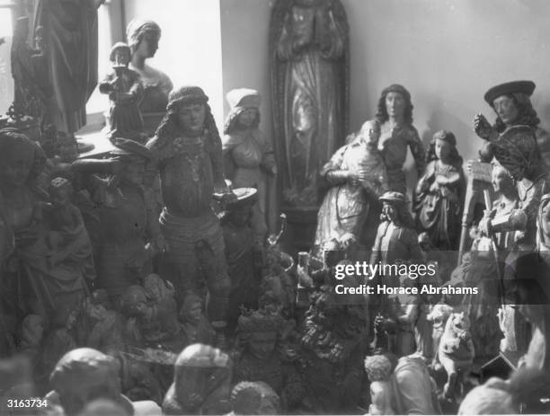 Room filled with antique statues, many looted from churches by Hermann Goering who amassed a vast collection of stolen treasures including a number...