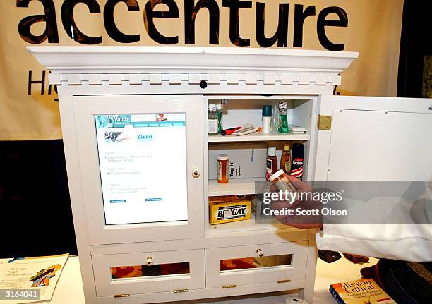 Accenture introduces a prototype medicine cabinet which uses radio frequency identification technology at the RFID Journal Live trade show March 30,...