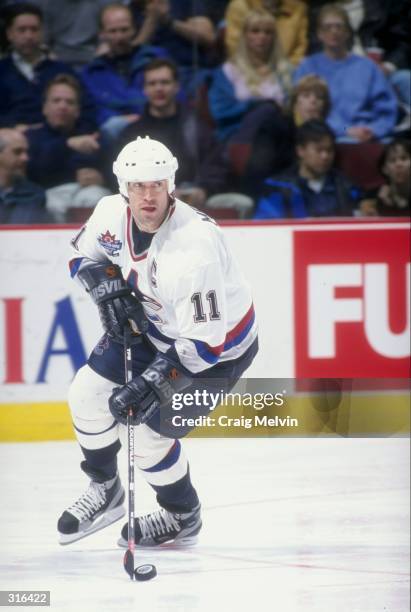 Center Mark Messier of the Vancouver Canucks in action against the Washington Capitals during a game at G.M. Place in Vancouver, British Columbia,...