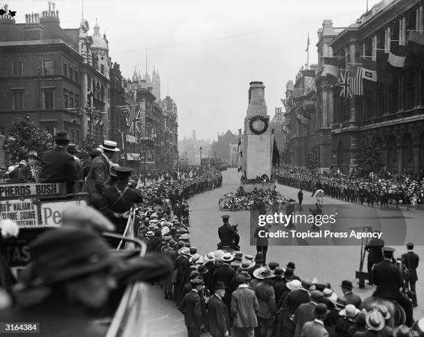 Crowds lining the streets during a war memorial ceremony at the Cenotaph in London.