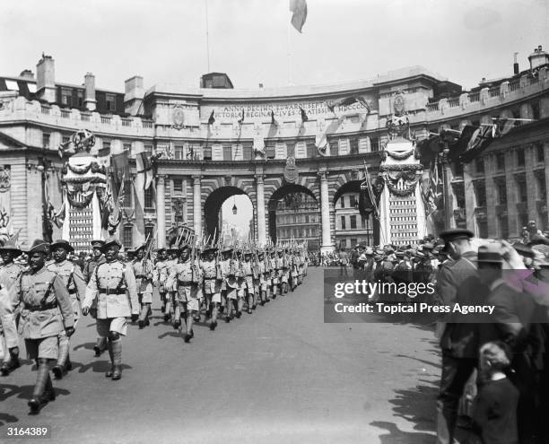 Gurkhas of the Indian Amy Contingent marching through Admiralty Arch to the Cenotaph during the London Peace Pageant, July 1919.