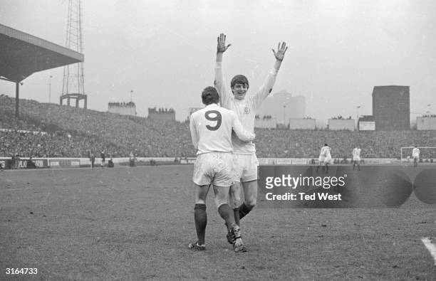 Leeds United forward Mick Jones congratulating Allan Clarke after his goal gave Leeds United the lead in the first division match at Stamford Bridge,...