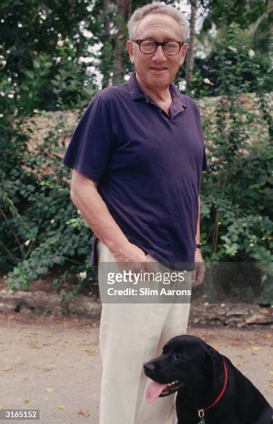 Former American Secretary of State Henry Kissinger at Casa de Campo with his dog.