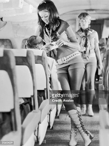 Stewardesses working for Southwest Airlines of Texas must be able to wear hot pants and kinky leather boots or they don't get the job. In accordance...