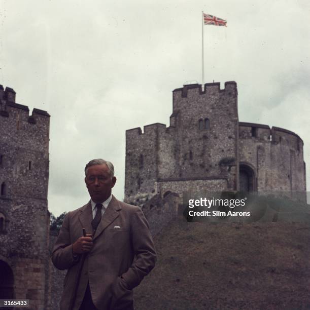 Bernard Fitzalan Howard , the 16th Duke of Norfolk, outside Arundel Castle in Sussex, where a Union Jack is flying. The castle has been the seat of...