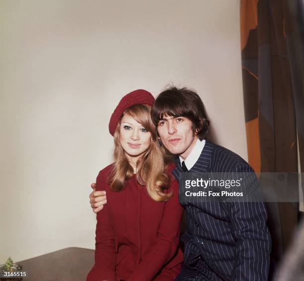George Harrison , singer, songwriter and guitarist with The Beatles pictured with his wife, model Patti Boyd.