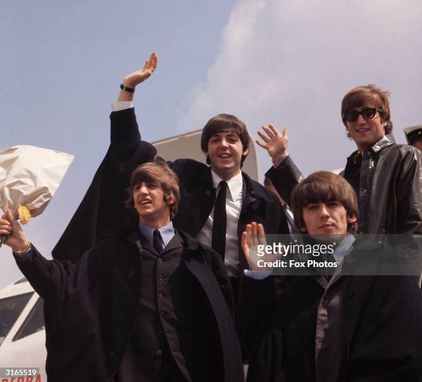 The Beatles, John Lennon, George Harrison , Paul McCartney and Ringo Starr, pictured on their arrival in London following a tour of Australia.