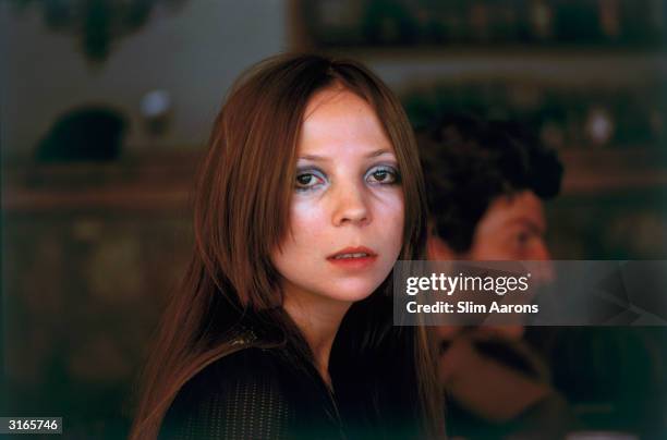Model Penelope Tree at Capri. In the background can be seen the photographer Patrick Lichfield, Earl of Lichfield.