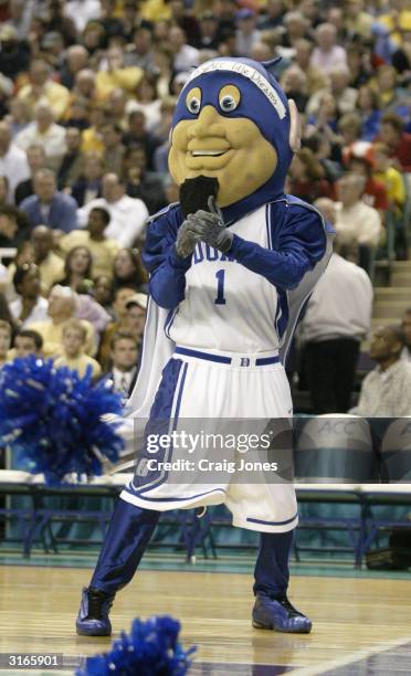 The Duke Blue Devils mascot performs on the court in the ACC Semifinal game against the Georgia Tech Yellow Jackets on March 13, 2004 at the...