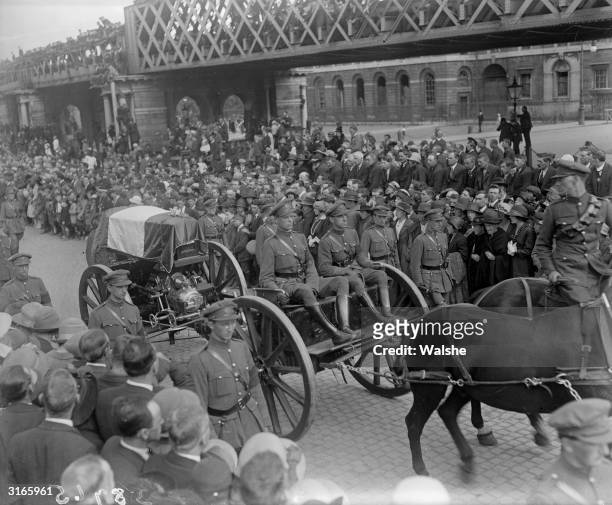 The coffin of Michael Collins, the leader of the Free State forces, who was assassinated by the IRA, being driven through the streets of Dublin with...