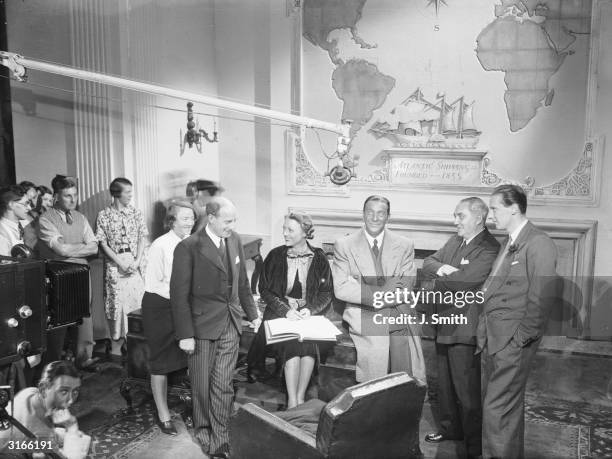 Film stars Sally Eilers and Ricardo Cortez with Dr Leslie Burgin and producer Jack Raymond and director Carol Reed at the opening of Pinewood Studios...