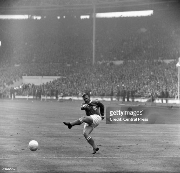 Hungarian born footballer superstar Ferenc Puskas, inside left for Real Madrid and his adopted country Spain, in action.