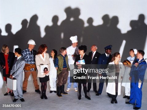 Workers from different professions talking, elevated view Workers from different professions talking, elevated view