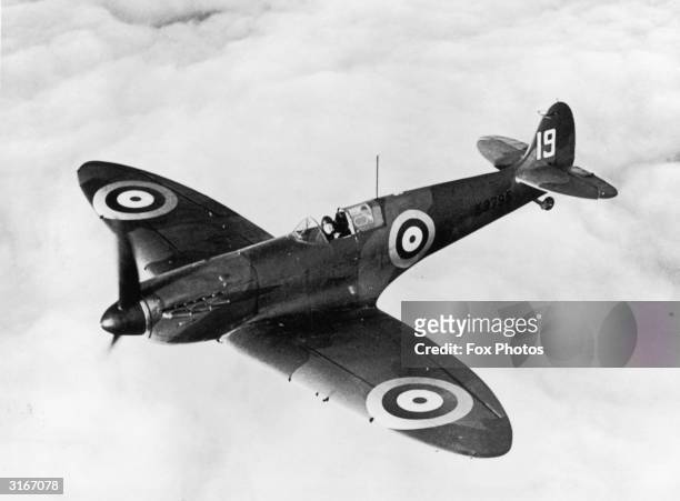 Spitfire I, equipped with a radio, in flight. Belonging to 19 Squadron at Duxford, Cambridgshire. It was one of the first to be supplied to the RAF.