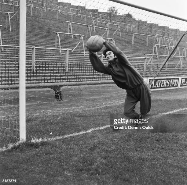 Alan Knott, England and Kent wicket-keeper, taking in some goal mouth practice at Charlton FC ground, The Valley, in preparation for the England...