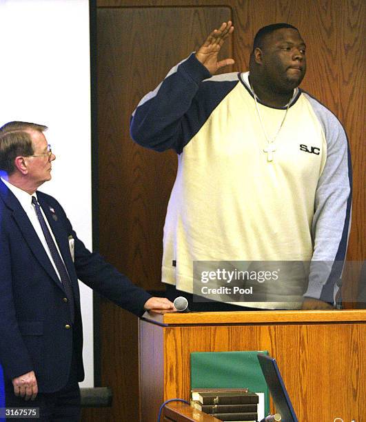 Troy Jackson stands as he is sworn in before testifying in the Jayson Williams manslaughter trial at the Somerset County Courthouse March 30, 2004 in...