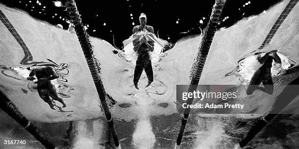 Brooke Hanson of Australia in action at the start of the womens 100m breastroke final during day 3 of the Telstra Olympic Team Swimming Trials at...