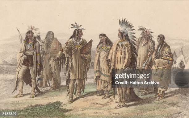 Representatives from various Native American tribes: from left to right, an Iroquois, an Assiniboine, a Crow, a Pawnee, an Assiniboine in gala dress,...