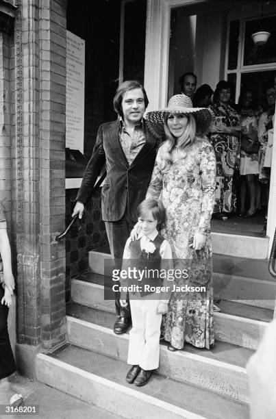 Cynthia Lennon with her 8 year old son Julian and her husband Roberto Bassanini, 28 year old son of an Italian hotelier. The newly-wed couple are...