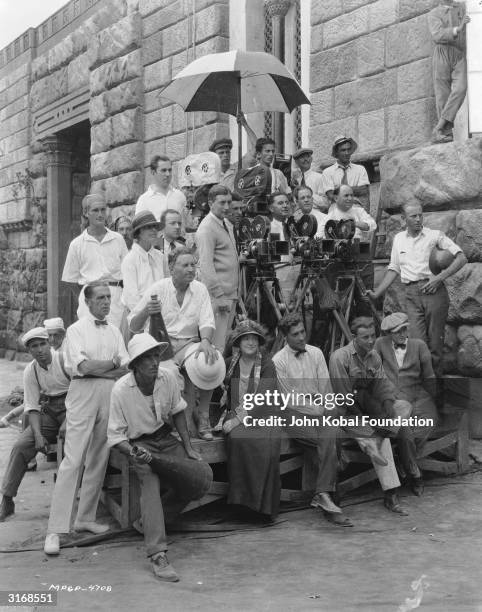 Director Fred Niblo with other crew members on the set of the Roman epic 'Ben-Hur'.