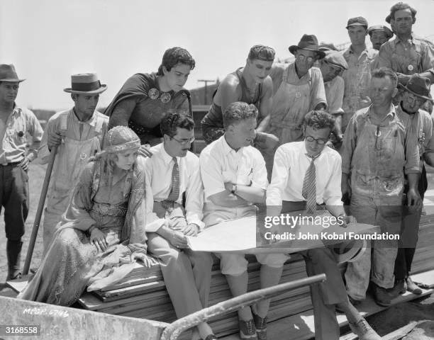 Mexican heart-throb Ramon Novarro and director Fred Niblo discuss the next scene of the Roman epic 'Ben-Hur'.