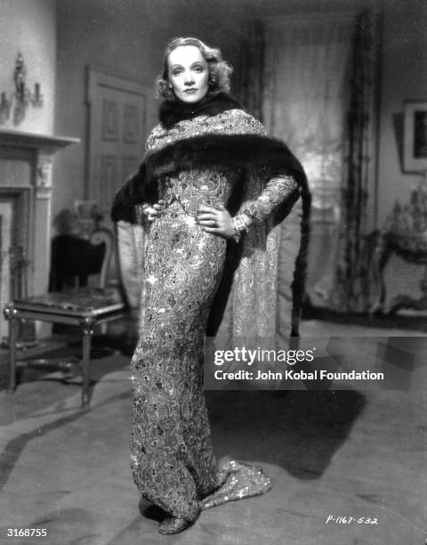 Marlene Dietrich in a scene from the romantic drama 'Angel', directed by Ernst Lubitsch for Paramount with costume designs by Travis Banton.