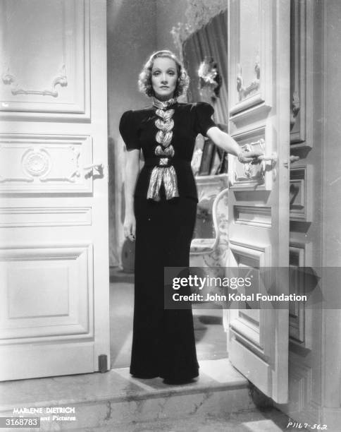 Marlene Dietrich in a scene from the romantic drama 'Angel', directed by Ernst Lubitsch for Paramount with costume designs by Travis Banton.