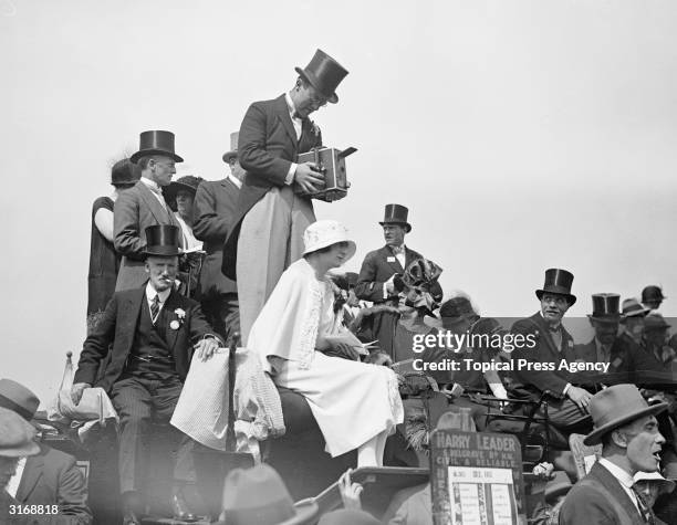 Comic actor Leslie Henson filming on the first day of Ascot.