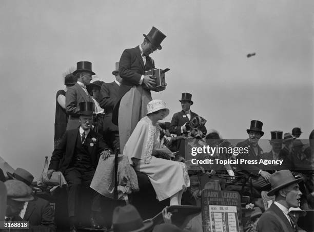 Comic actor Leslie Henson filming on the first day of Ascot.