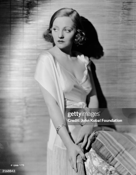 American film star Tallulah Bankhead wearing a silk negligee in a promotional still for the 1932 film 'Devil And The Deep'. Bankhead regularly...