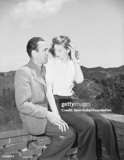 American actor Humphrey Bogart with his wife, Lauren Bacall, his co-star in 'To Have and Have Not' and 'The Big Sleep'.