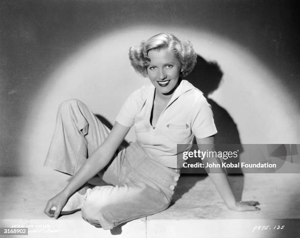 Film star Jean Arthur in the spotlight.