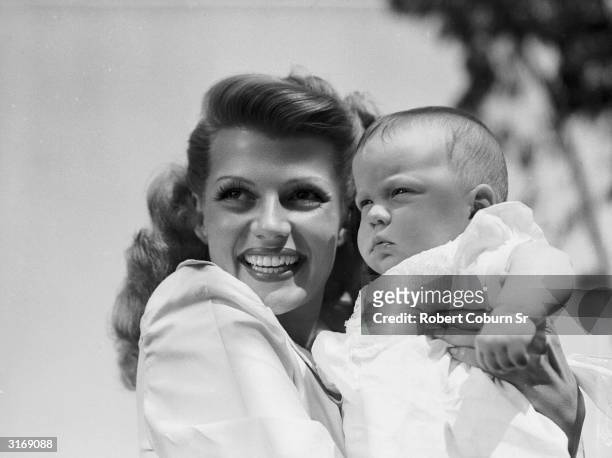 American film actress, dancer and singer Rita Hayworth with her daughter Rebecca.