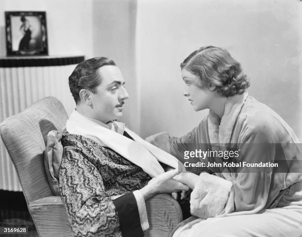 Myrna Loy and William Powell play sleuthing couple Nick and Nora Charles in 'The Thin Man', directed by W S Van Dyke.