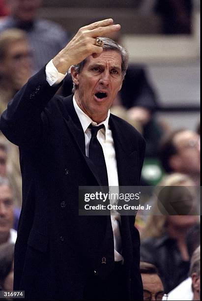 Head coach Jerry Sloan of the Utah Jazz looks on during an NBA playoff game against the Houston Rockets at the Delta Center in Salt Lake City, Utah....