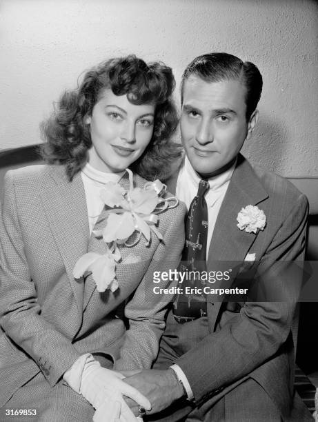 American actress Ava Gardner and American jazz musician and bandleader Artie Shaw pose together the day after their wedding, October 18, 1945. The...