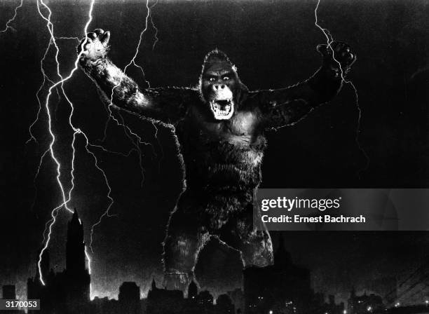 One of John Cerisoli's models of the giant ape, poised above the New York skyline in a scene from the classic monster movie 'King Kong'.