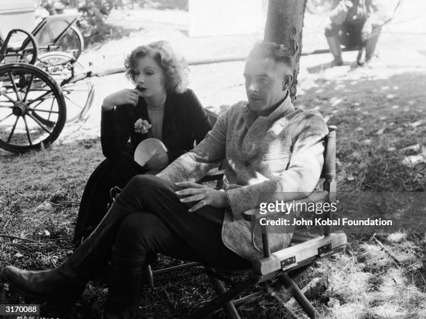 Swedish born American actress Greta Garbo and her fellow actor and lover John Gilbert . The pair starred in several films together and their...
