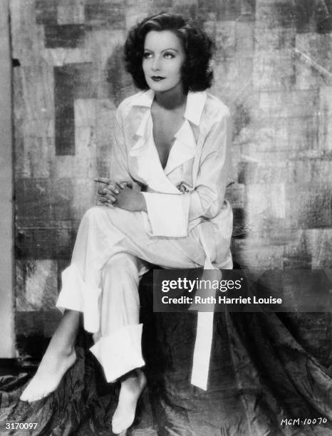 Swedish born American actress Greta Garbo , whose early retirement and solitary nature only added to the mystique which surrounded her for the rest...