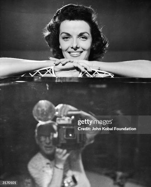 American actress Jane Russell has her picture taken to publicise the 3D musical comedy 'The French Line', directed by Lloyd Bacon.