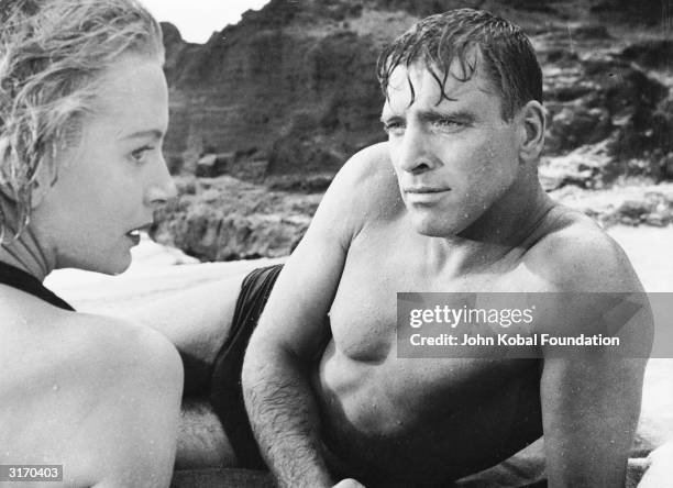 Burt Lancaster and Deborah Kerr get passionate on a beach in the classic love scene from Fred Zinnemann's 'From Here to Eternity'.